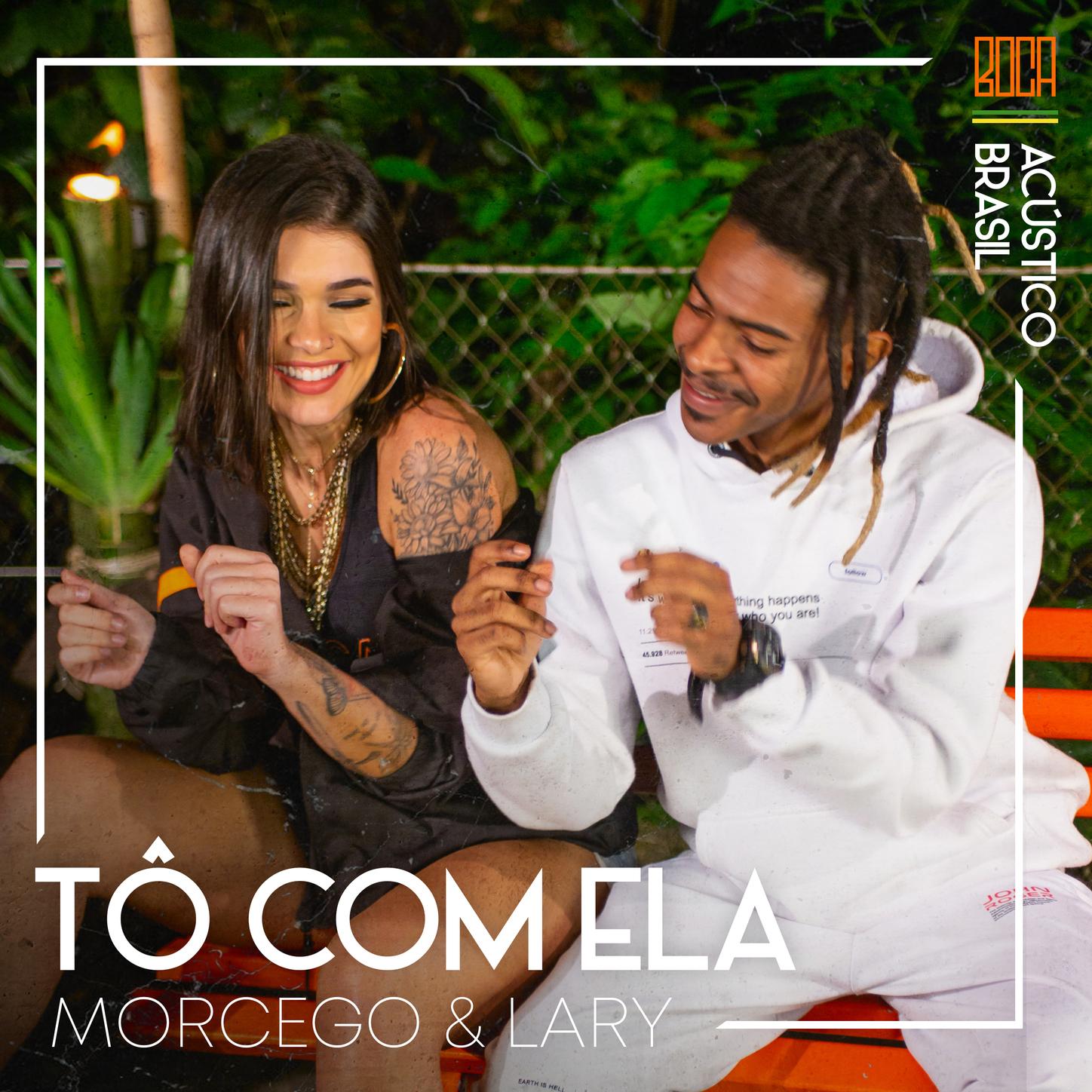 T Com Ela